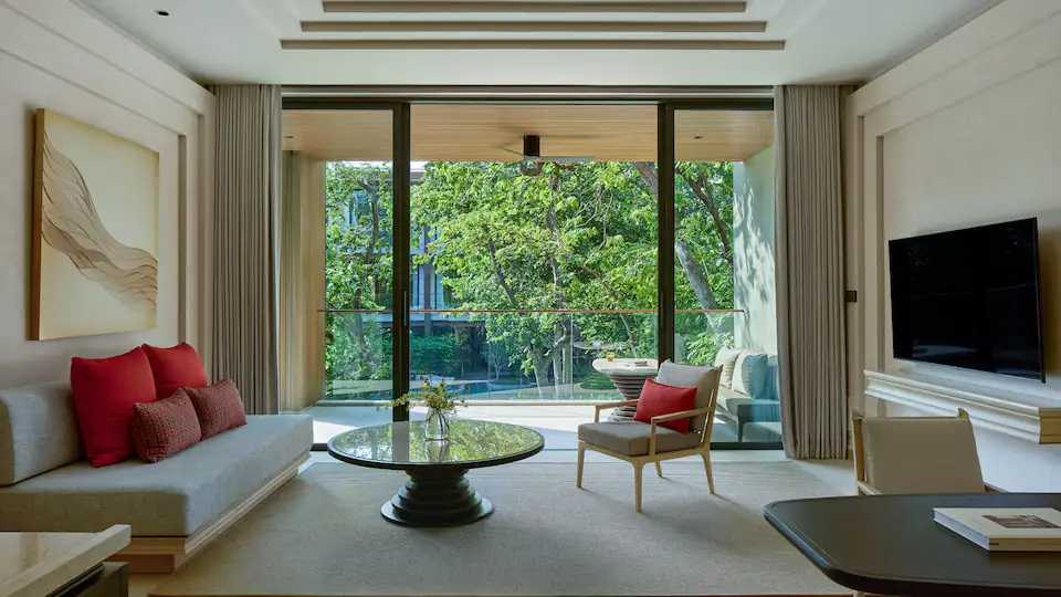 3 HHQUB-P0023-Unbound-Suite-Forest-With-Terrace-Living-Room.16x9