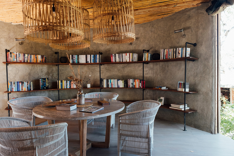 Asilia-Africa-Jabali-Ridge-Sink-into-a-comfy-chair-and-read-one-of-the-books-available