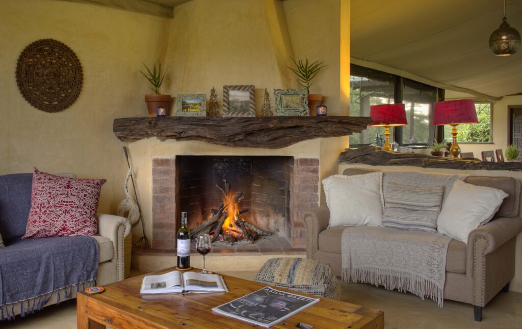 Asilia-Ol-Pejeta-Bush-Camp-lounge-area-with-fire