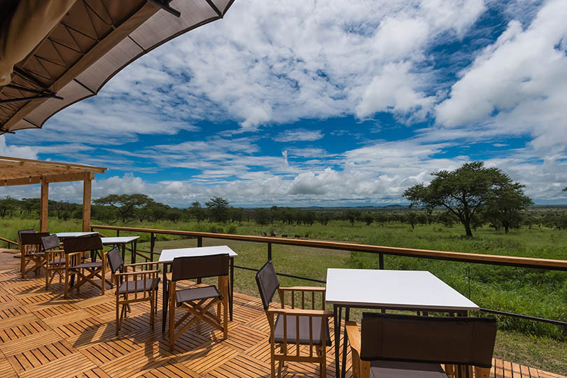 Dunia-dining-tables-on-the-new-deck-over-looking-the-view