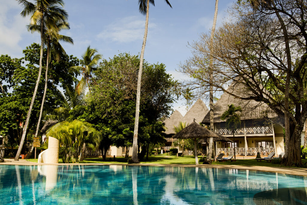 Neptune Palm Pool and Bungalows View