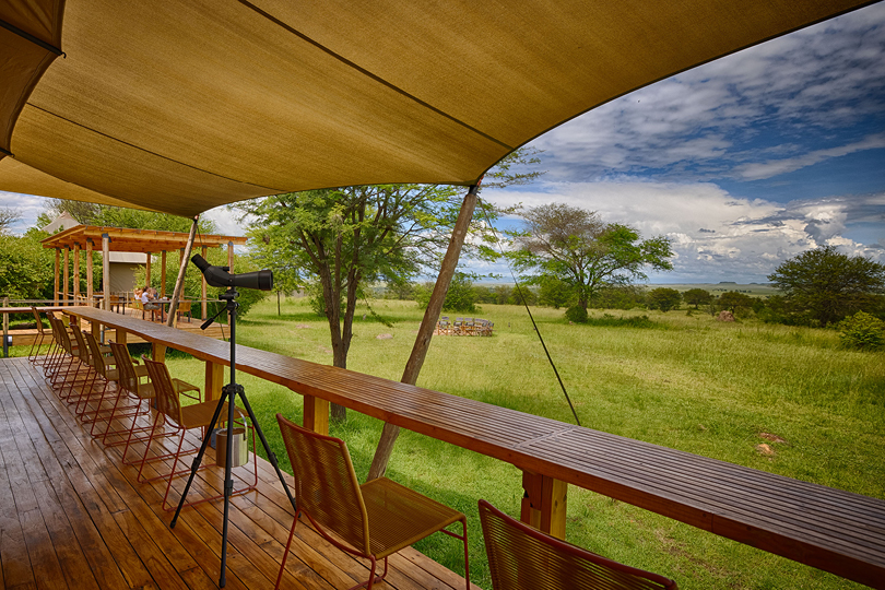 Sayari-deck-with-viewing-area-and-scope-to-search-for-wildlife-in-the-wilderness-beyond